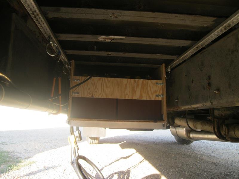 Power distribution box hanging from L-Track